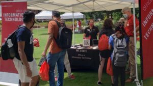 OIT staffers greet students at Campus Department Fair.