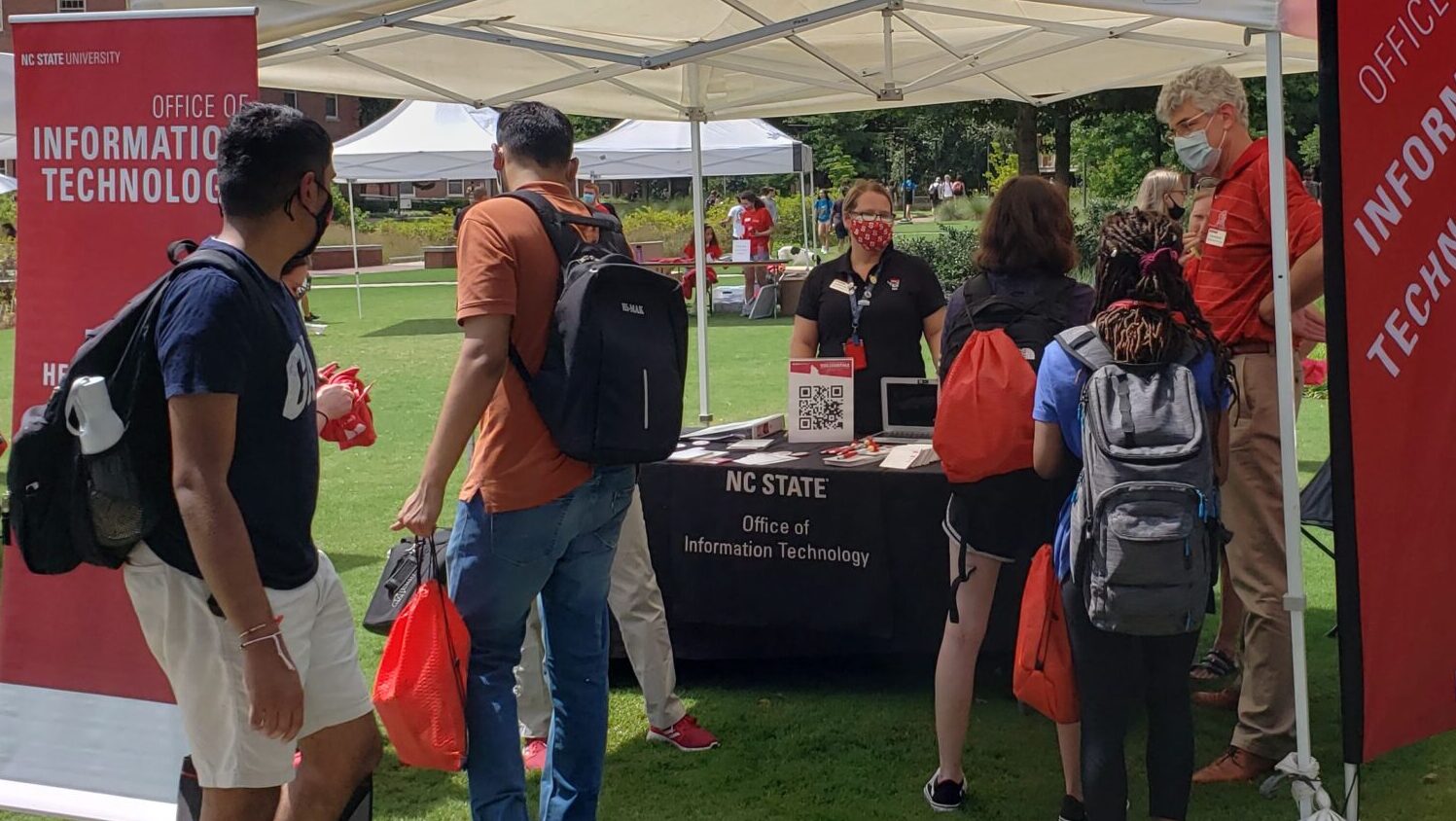 OIT staffers greet students at Campus Department Fair.