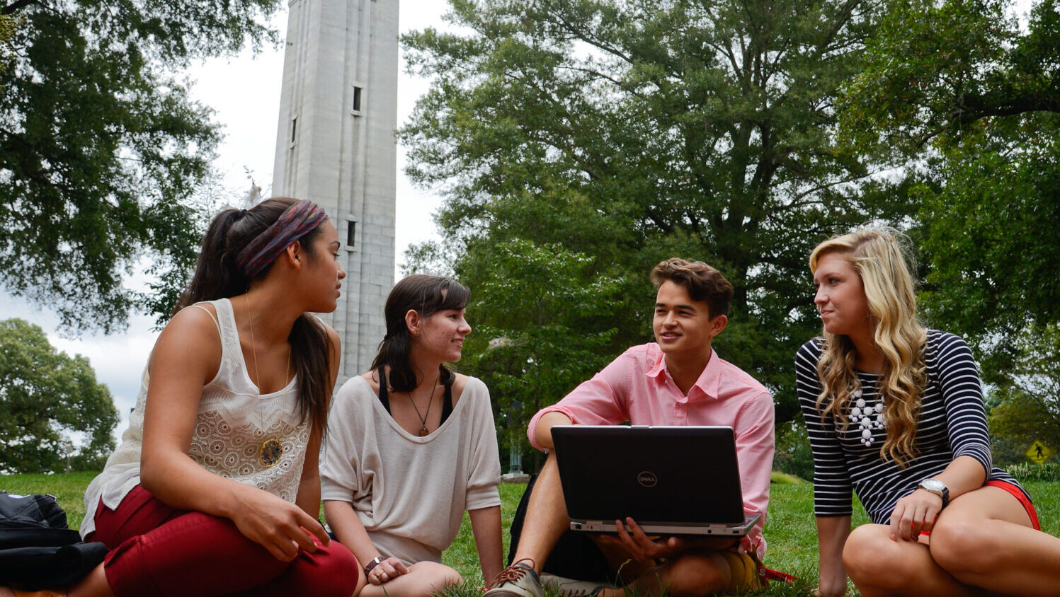 Students talk at the Belltower on campus