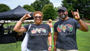 Vice Chair Verna Little and Chair Mark Williams of the African American Faculty and Staff Organization volunteer at the inaugural Juneteenth event held at the Witherspoon Student Center. Photo by Marc Hall