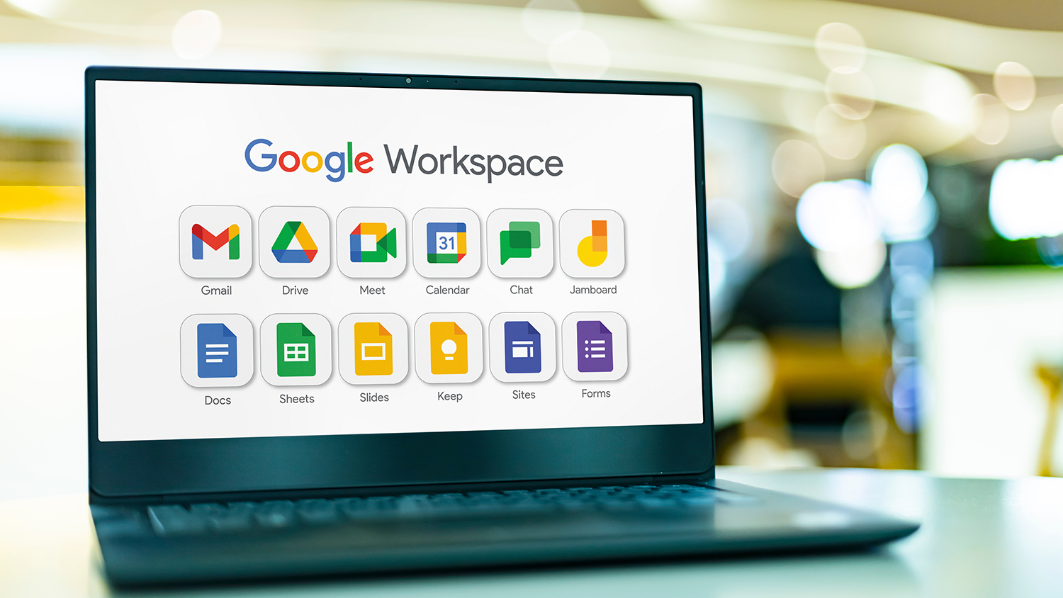 Photo of computer displaying Google Workspace Apps