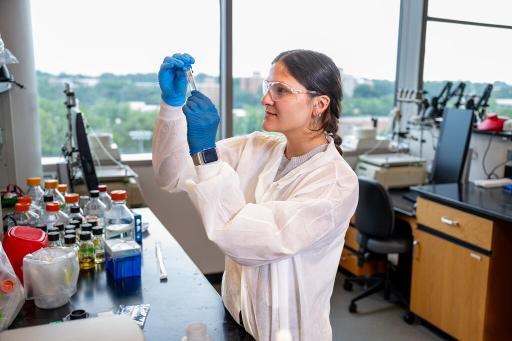 Mikalina Fisher runs an experiment as part of the Biotechnology Program Summer Undergraduate Research Experience.