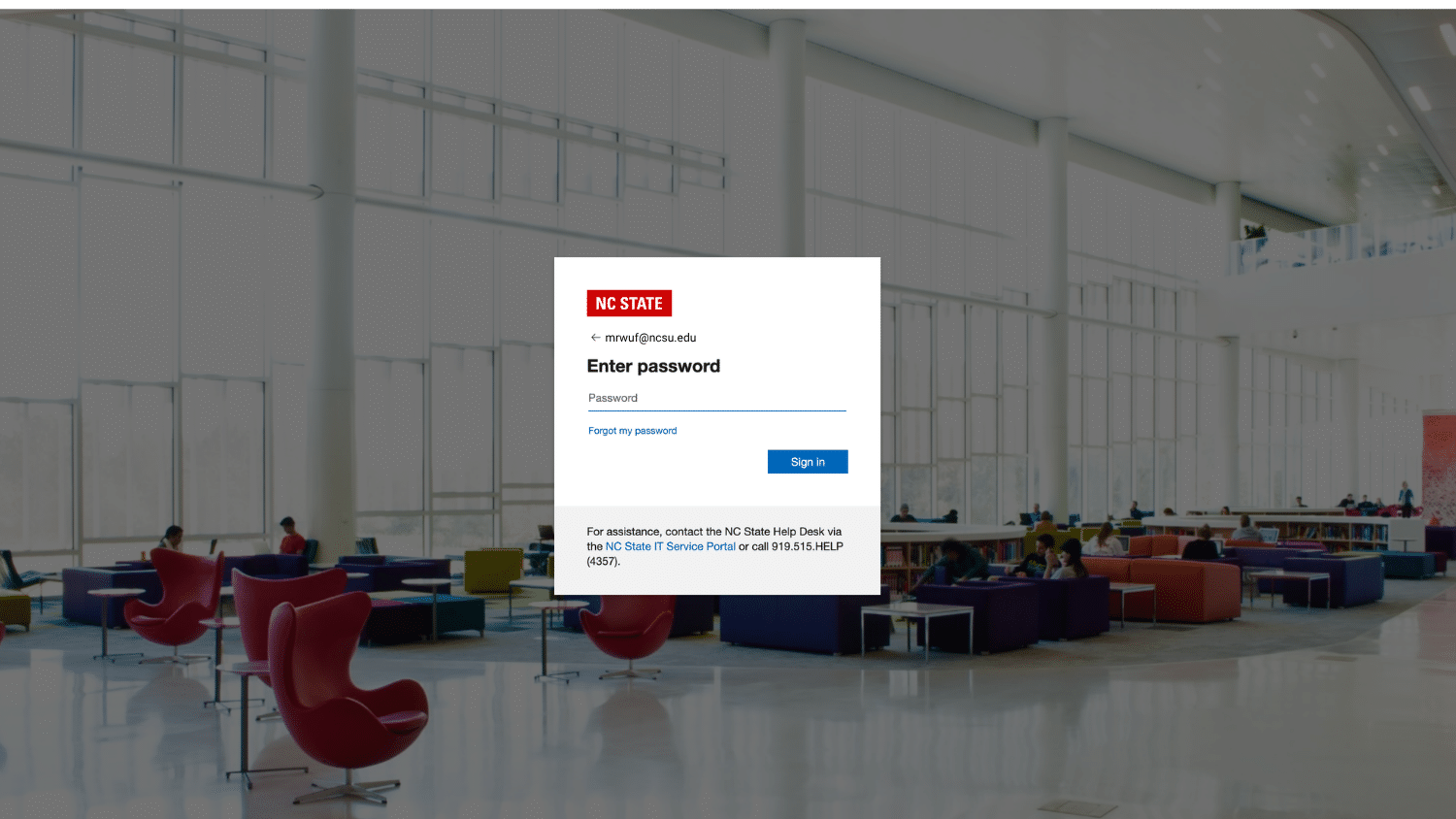 Example of the Entra login screen with a background image of Hunt Library and a box for logging in.